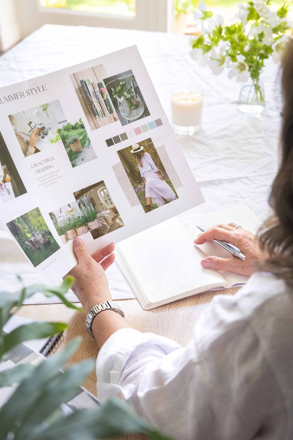 Web designer in the studio with a mood board