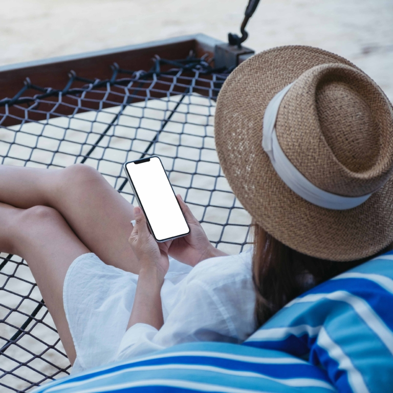 Woman holding a phone, responsive web design